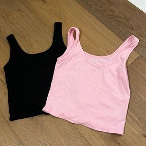 Black and pink v-neck cropped tanks